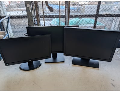 Lot of three computer monitors, various models.
...