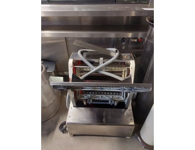 Commercial bread slicer by Sinmag, model featuring...