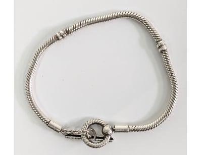 Pandora sterling silver snake chain bracelet. Feat...