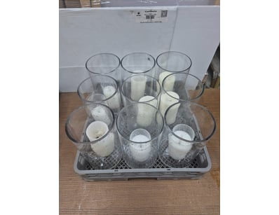 Lot of 9 ledlight candles with candle holders.

So...