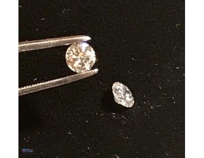 0.04TCW  LIGHT BROWN 2 ROUND DIAMOND         

Con...