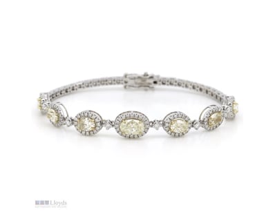 14K YELLOW/WHITE GOLD, 3.63CT TDW FANCY YELLOW DIA...