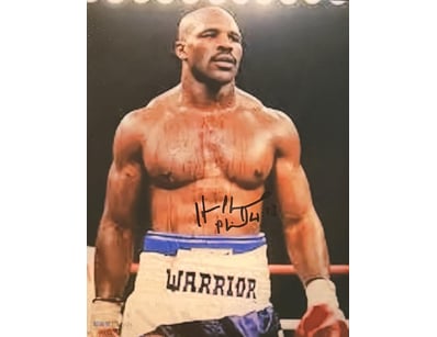 EVANDER 'REAL DEAL' HOLYFIELD SIGNED PHOTO 

Evand...