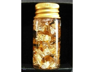 FLOATING 24CT. GOLD LEAF IN GLASS BOTTLE, (50MM(H)...