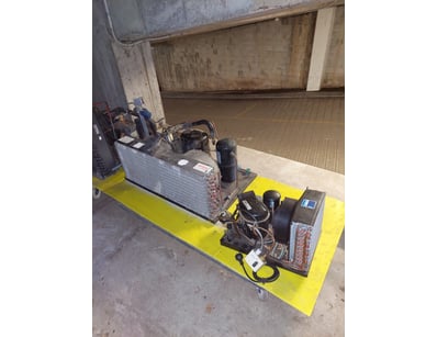 Refrigeration condensing unit assembly mounted on ...