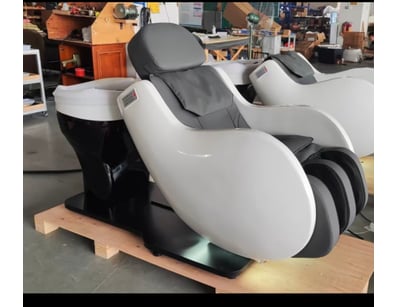 Professional massage chair with wash basin in whit...
