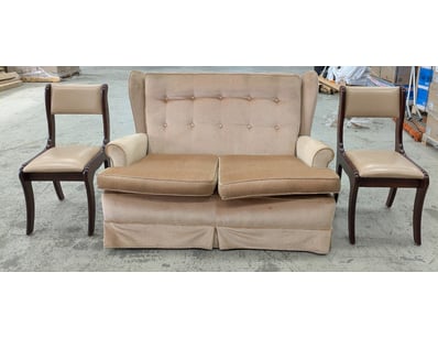 Classic wingback settee with button-tufted backres...