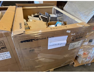 Large pallet containing genuine automotive parts f...