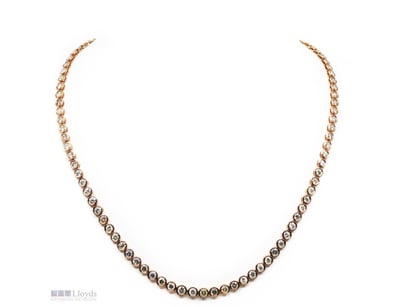 14K ROSE GOLD AND 16.40CT CHAMPAGNE DIAMOND, RIVIE...