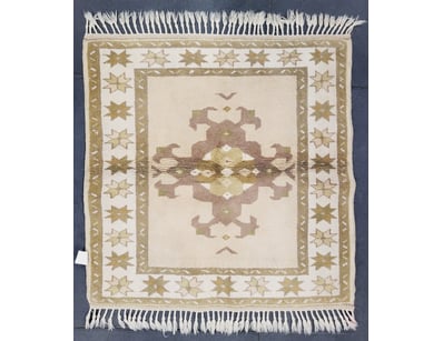 HANDMADE TURKISH KARS WOOL RUG WITH FRINGE TRIM

I...