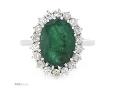 14K WHITE GOLD, EMERALD AND DIAMOND, HALO RING.   ...