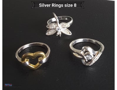3 X SILVER RINGS ASSORTED STYLES SIZE 8        

C...