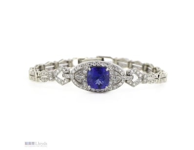 PT 950, TANZANITE AND DIAMOND, ART DECO INSPIRED B...