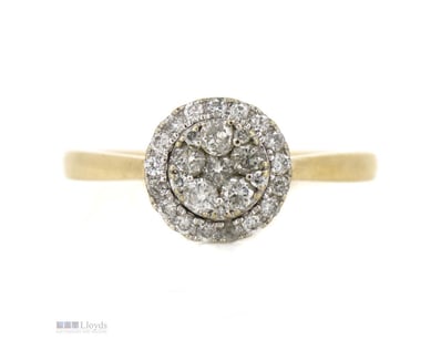 10K YELLOW GOLD AND DIAMOND, HALO RING.      

The...