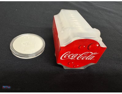 TWENTY ONE 1OZ .999 FINE SILVER COCA COLA TOKENS
...