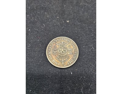 BRITISH ONE SHILLING COIN, 1941

584608+17