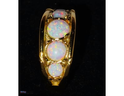 17 TCW PLATED OPAL RING. NICE ARRAY OF RAISED OPAL...