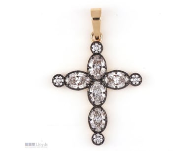 2.06 CT OVAL & ROUND DIAMOND CROSS PENDANT IN 18KT...