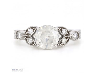 14K WHITE GOLD AND DIAMOND, DRESS RING.      

The...