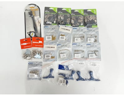 Assortment of metal cricket spikes, blank pins for...