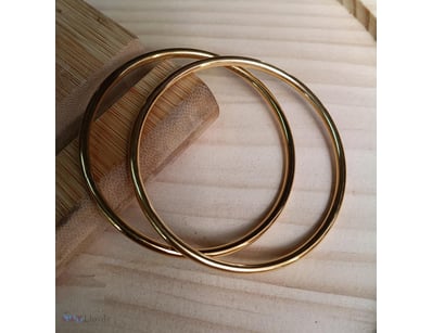 2 X GOLD STAINLESS STEEL BANGLES        

Conditio...