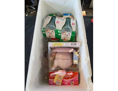 Collectible merchandise lot featuring branded prom...