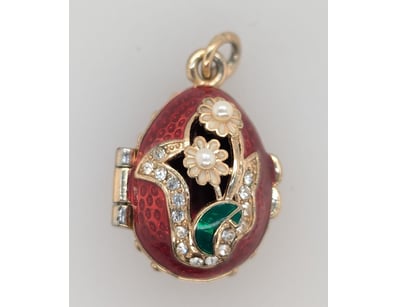 GOLD PLATED CZ EGG PENDANT


583010+30


