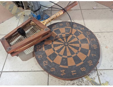 Dart Board & Tennis Racket

SOLD AS LOT

