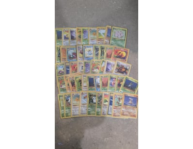 ASSORTED POKEMON 1999 BASE JUNGLE SINGLES

Include...