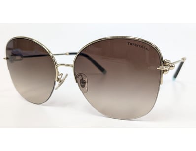 Tiffany & Co. Model TF3082 sunglasses featuring a ...