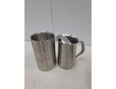 X2 Pitcher & x6 Wine Coolers

SOLD AS LOT

