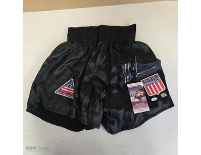 AUTOGRAPHED BLACK BOXING SHORTS WITH USA FLAG PATC...