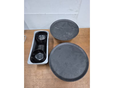 Lot of small black plastic bowls and 2 cake stands...
