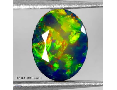 NATURAL 1.07CT OVAL FACET RAINBOW FIRE OPAL     

...