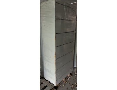 Multi-drawer chest of drawers featuring a modern h...
