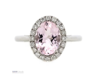 14K WHITE GOLD, MORGANITE AND DIAMOND RING.      
...
