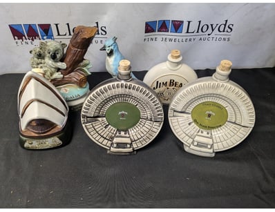 JIM BEAM CERAMIC DECANTER COLLECTION

Item Size:...