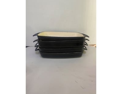 Lot of black ceramic baking trays. x4. 36cm x 22cm...