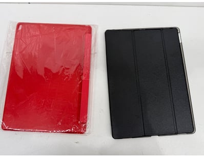 Lot of 2 IPad cases in various colours and styles....