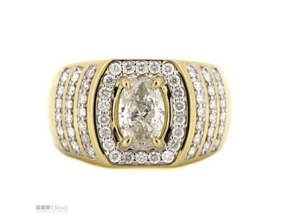 14K YELLOW GOLD AND DIAMOND, GENTS RING.      

Th...