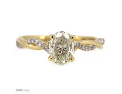 14K YELLOW GOLD AND DIAMOND, TWIST BAND RING.     ...