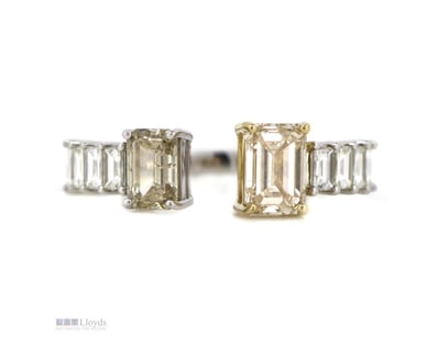 THE DESIGN FEATURES, TWO EMERALD CUT, DIAMONDS (1....