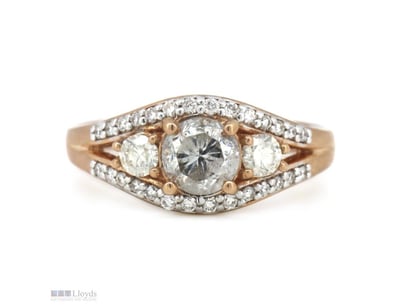 14K ROSE GOLD AND DIAMOND, TRILOGY RING.      

Th...