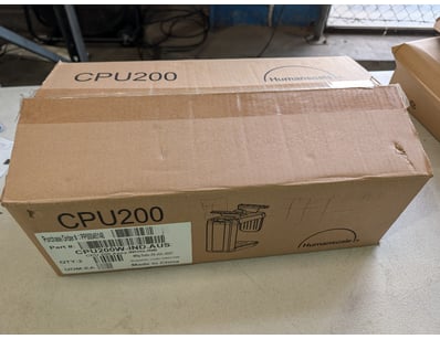 Two Humanscale CPU200 white desk-mounted CPU holde...