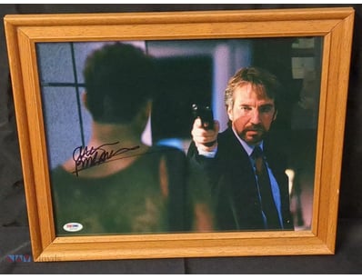 THIS FRAMED IMAGE FEATURES A SIGNED PHOTOGRAPH OF ...