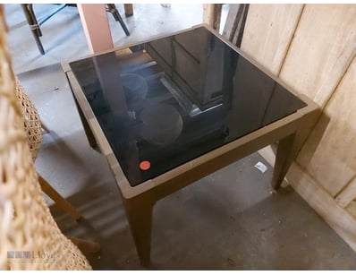 Glass Top Side table featuring a natural timber fr...