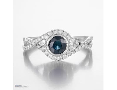14CT WHITE GOLD BLUE SAPPHIRE AND DIAMOND HALO RIN...