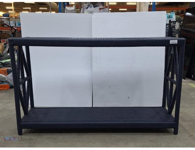Black woven rattan outdoor shelving unit featuring...