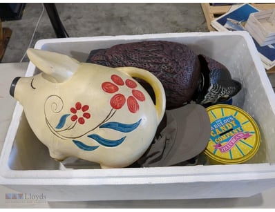 Assorted items inc; piggy banks, tins and more. Qt...