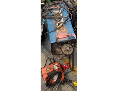 Portable electric hoist system and welding machine...